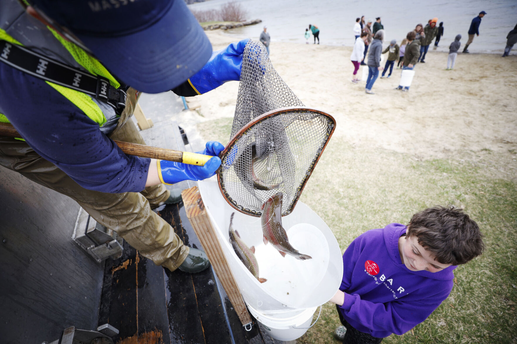 leanda fontaine filling bucket with trout